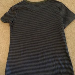 Green and blue striped shirt